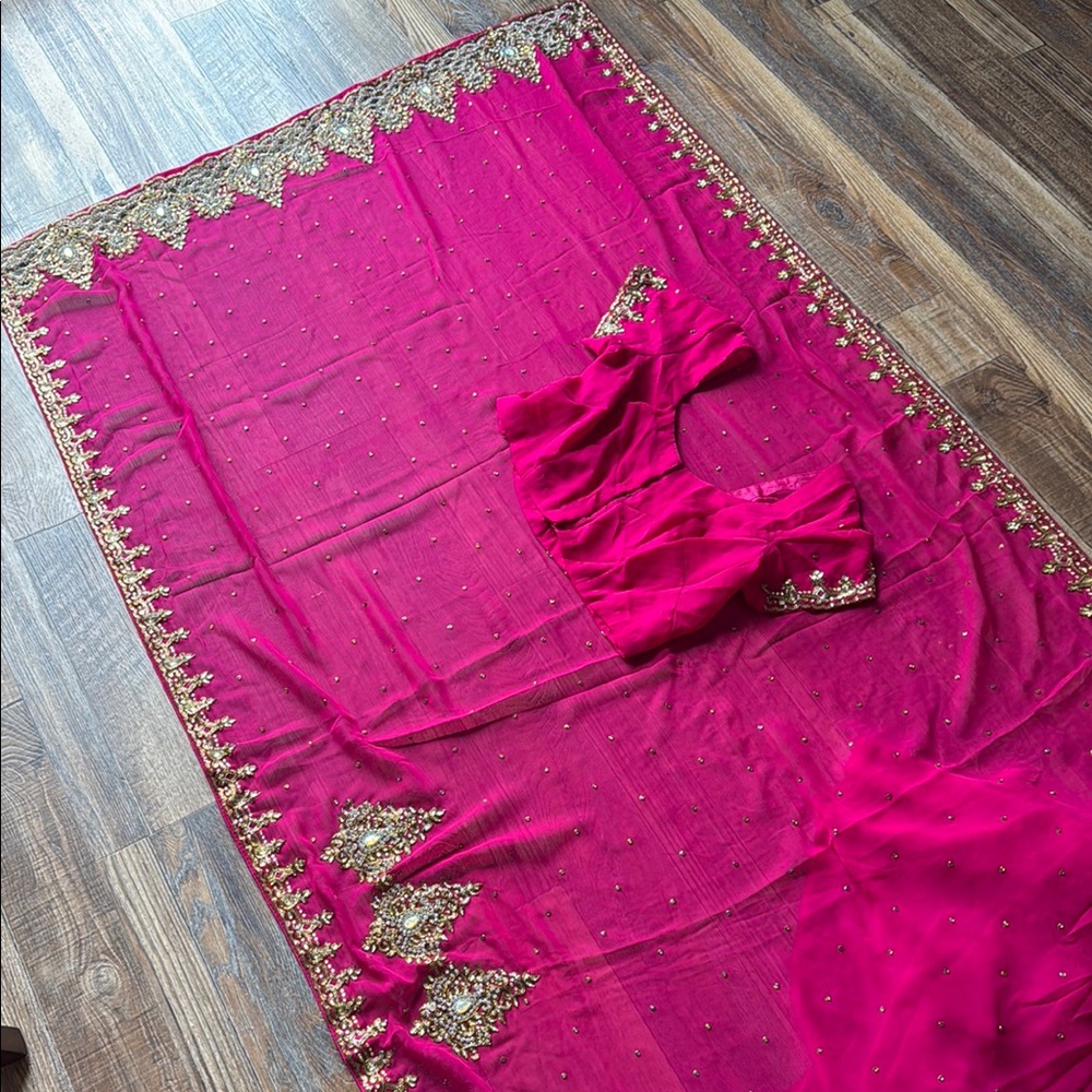 Elegant Pink Saree with Gold Embellishments